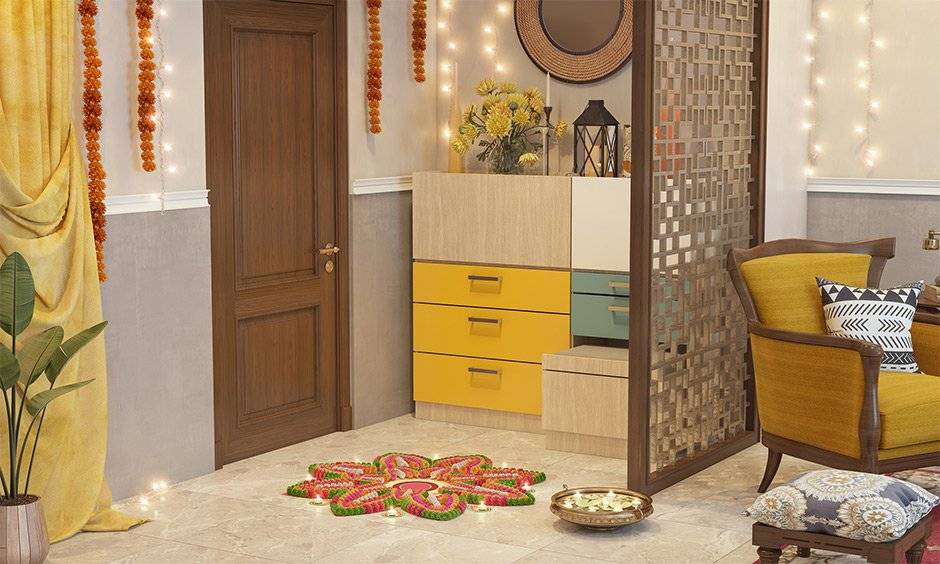 All about entryway partition design- opt for a jaali partition that helps separate the entryway from the internal areas