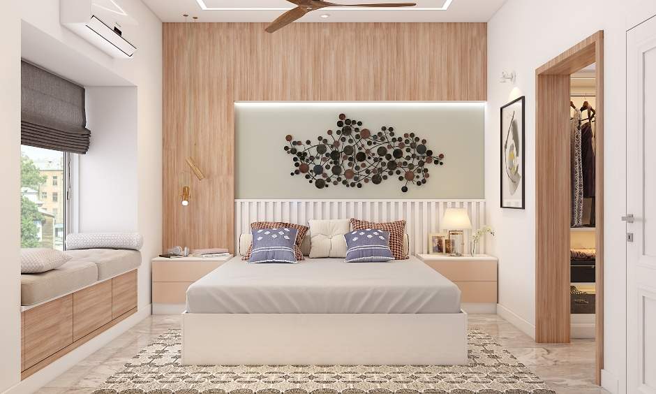 Apartment bedroom designed with light wood laminates