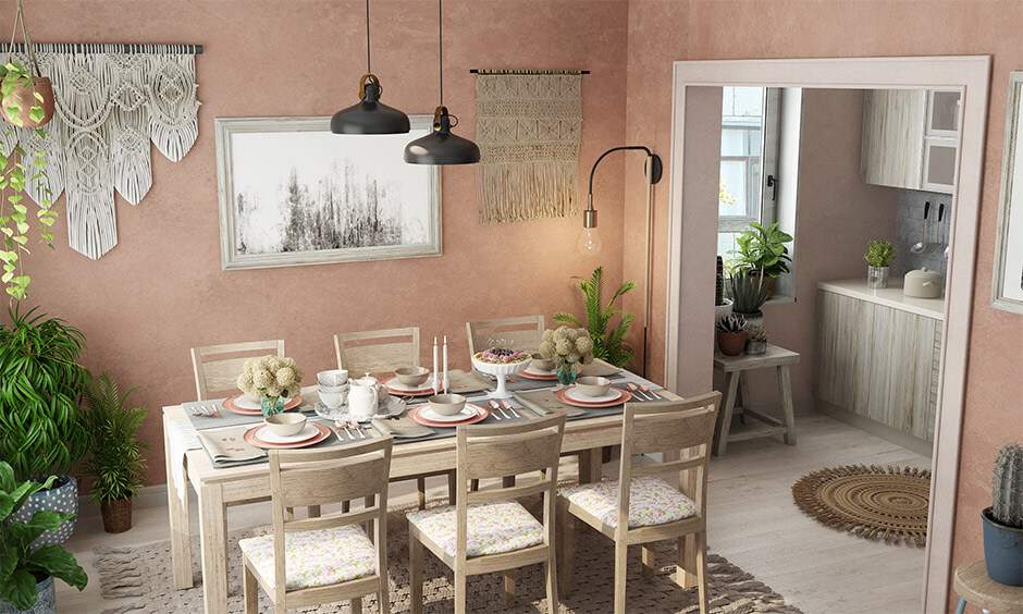 Personalised simple dining room with vintage tablecloth, ceramics, and a handmade pendant lamp.